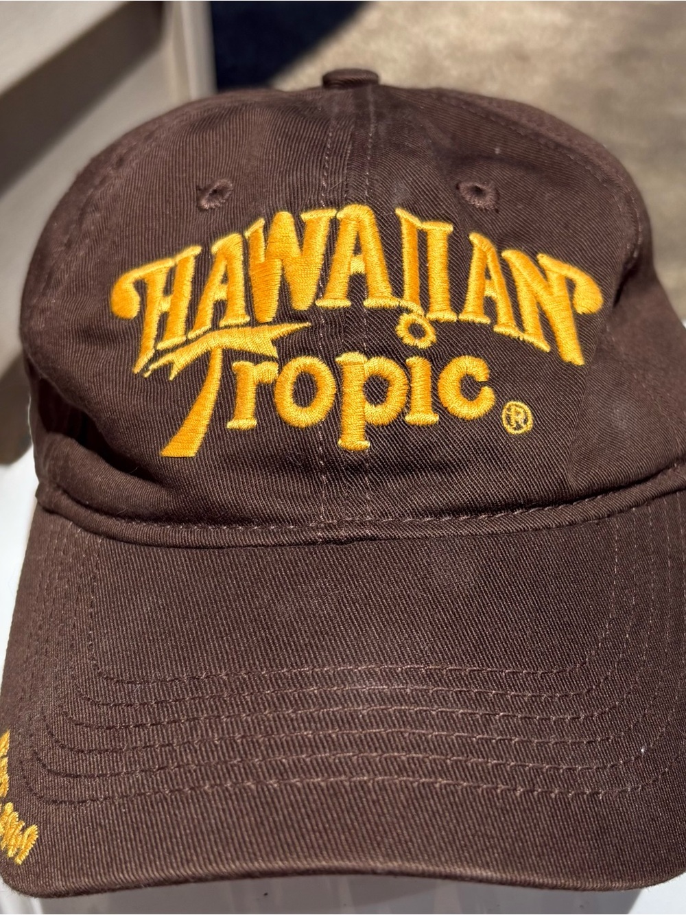 Hawaiian Tropic Brown Baseball Cap with Gold Embroidered Logo